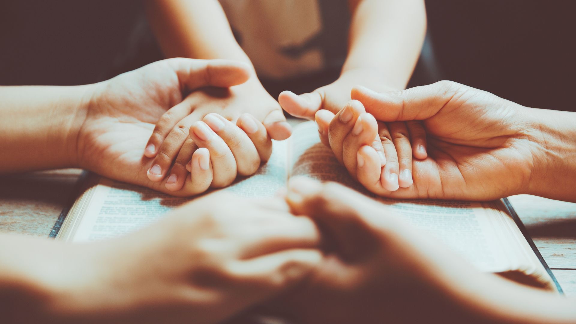 Hands holding in prayer